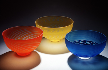 Zigzag - Zigzag (left / orange) is a blown glass vessels by John Penman featuring filigrana with a