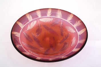 Huru Platter 2 - Huru platters are blown glass objects from photosensitive glass with color-overlay. The imagery is created by